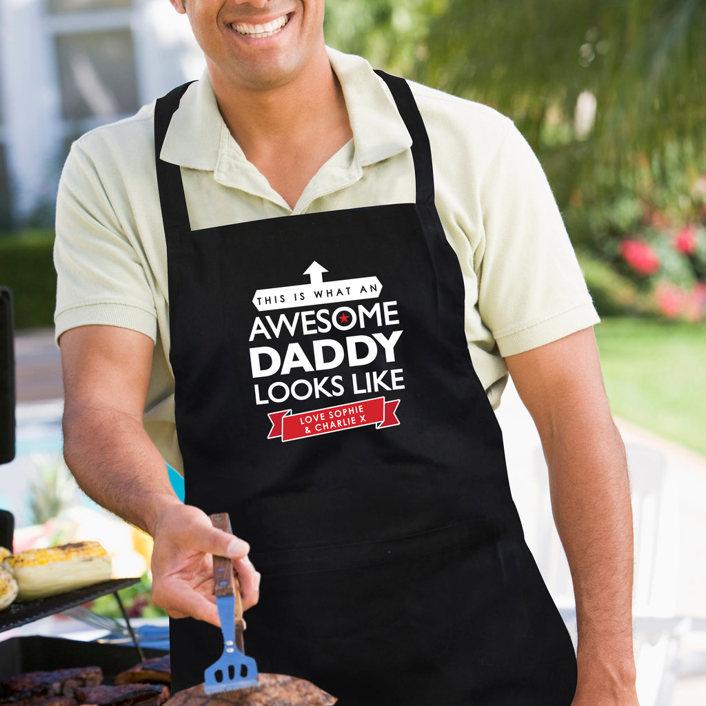 Personalised 'This is What an Awesome... Looks Like' Black Apron - Buy Kitchen, Baking & Dining Gifts at GiftMasters.co.uk