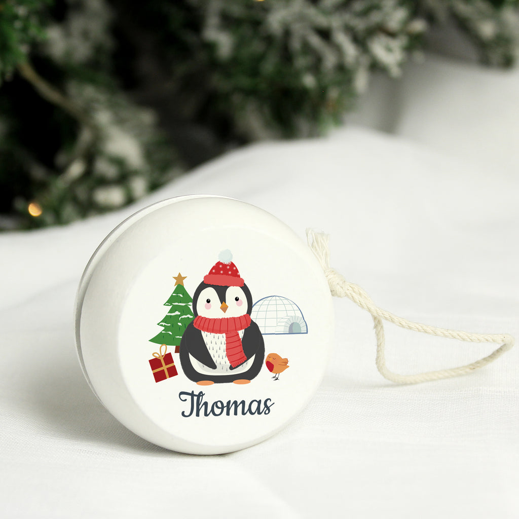 Personalised Christmas Penguin White Wooden Yoyo - Buy Keepsakes at GiftMasters.co.uk
